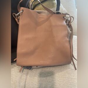 Rebecca Minkoff 
•North South Tote 
•Leather
•Magnetic closure
•Silver hardware